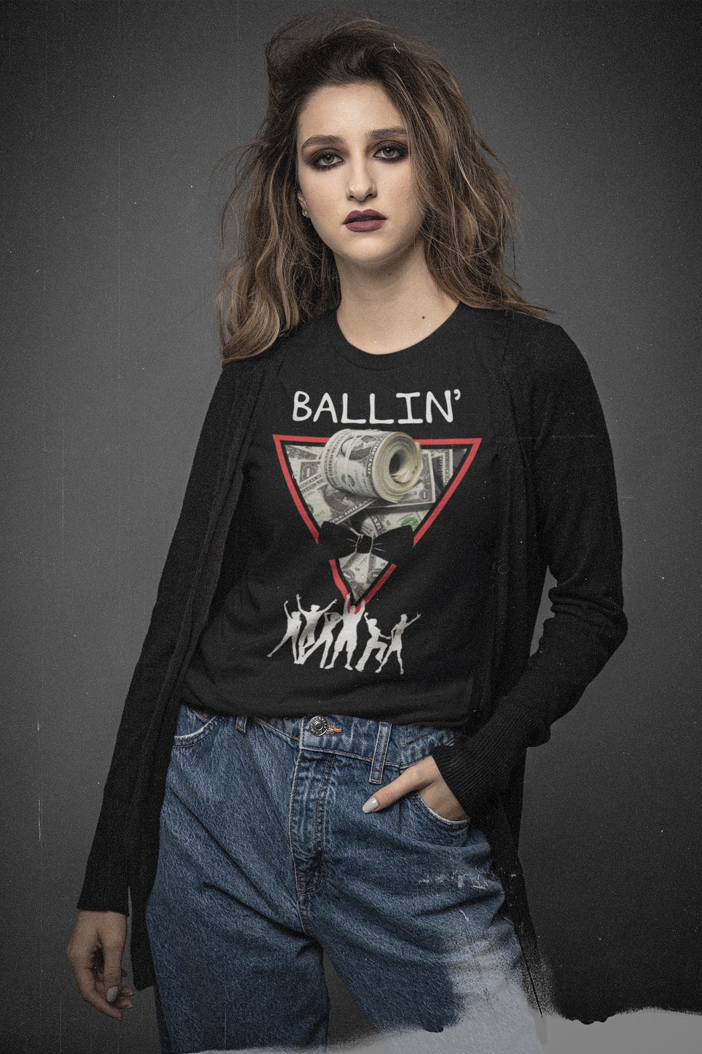 Close-up of Ballin’ graphic on a black tee with framed cash-roll collage