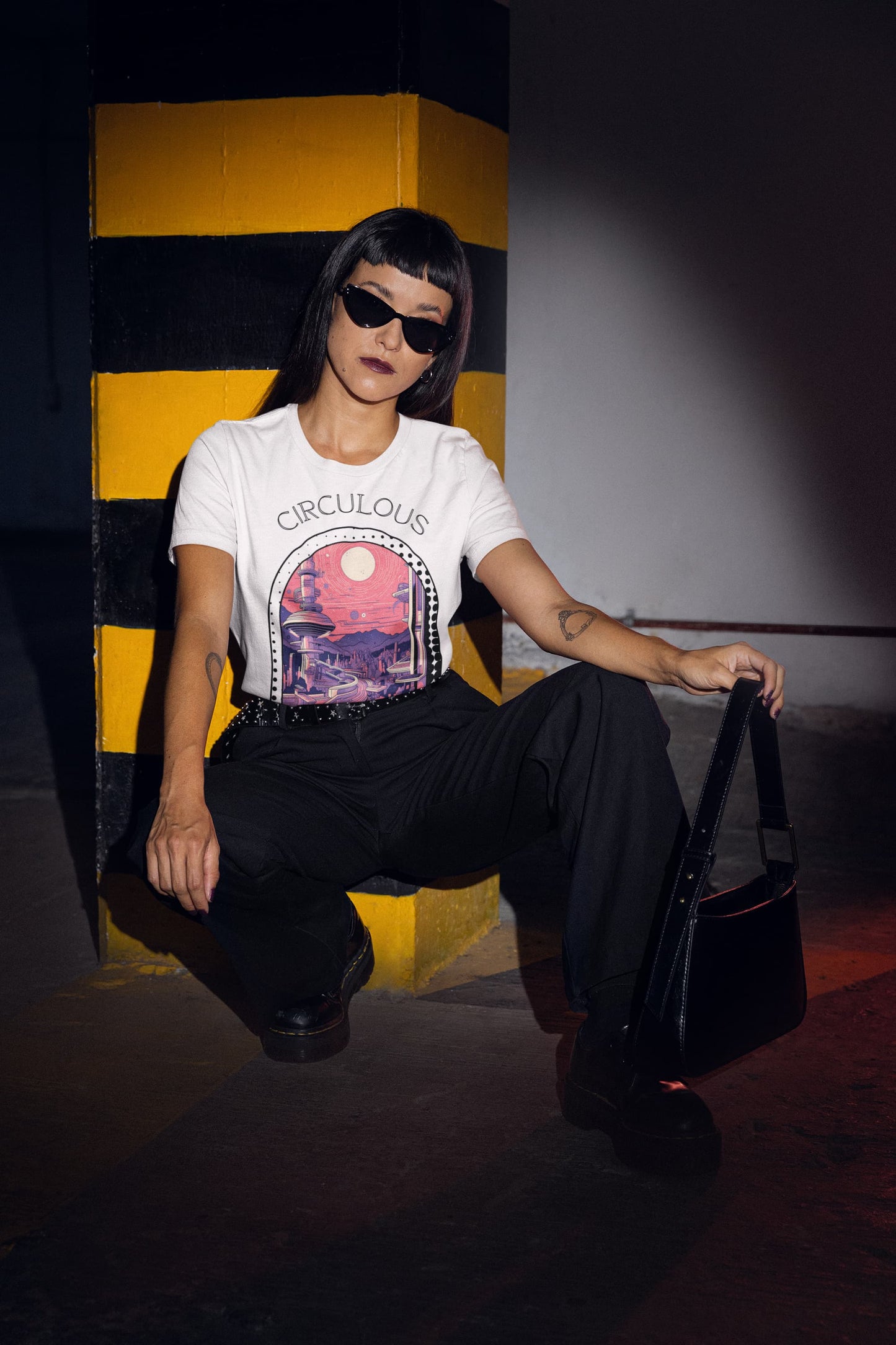 White graphic tee Quantum Quarters futuristic architecture winding pathways portal
