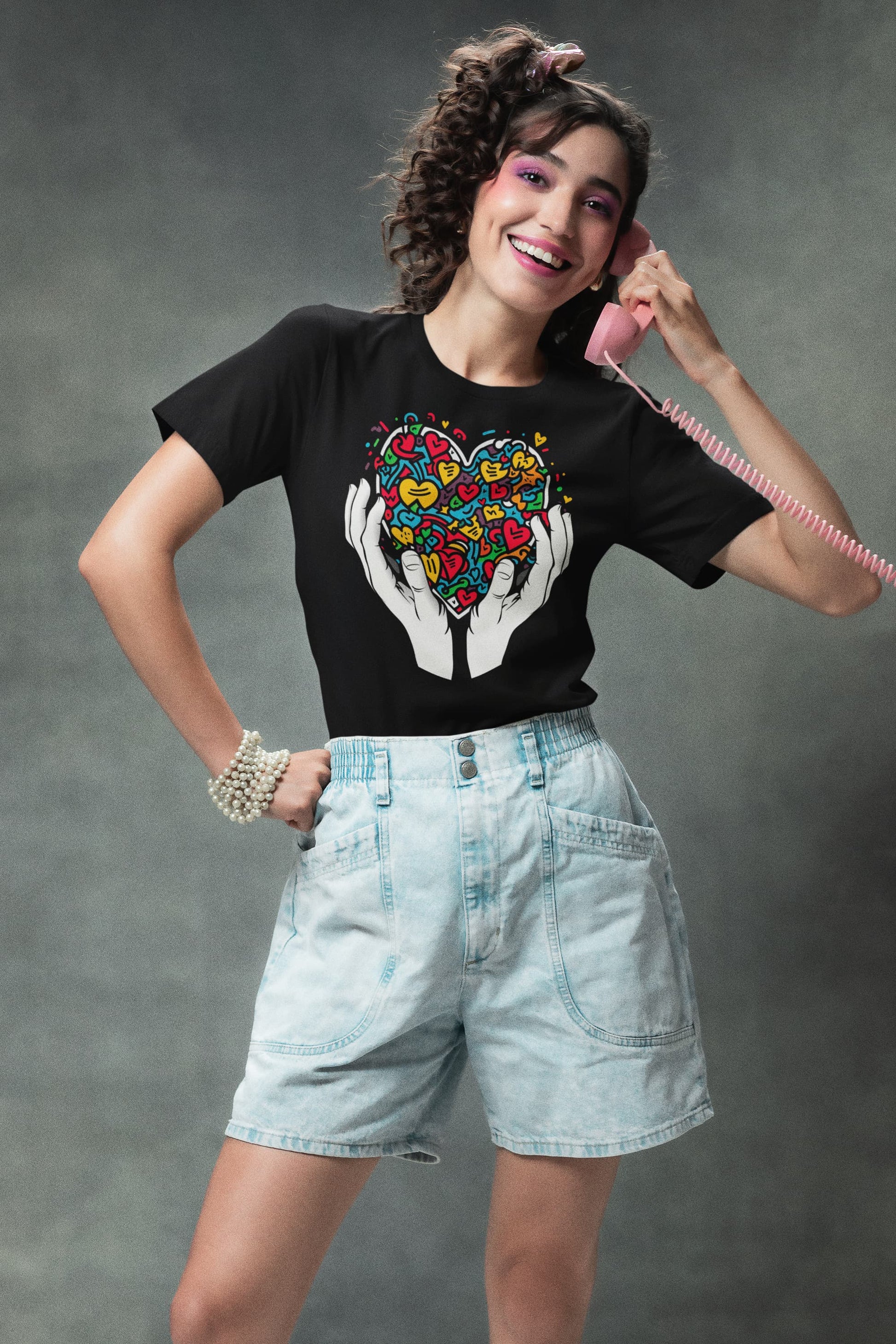 Vibrant Love graffiti tee hands holding colorful hearts explosion
