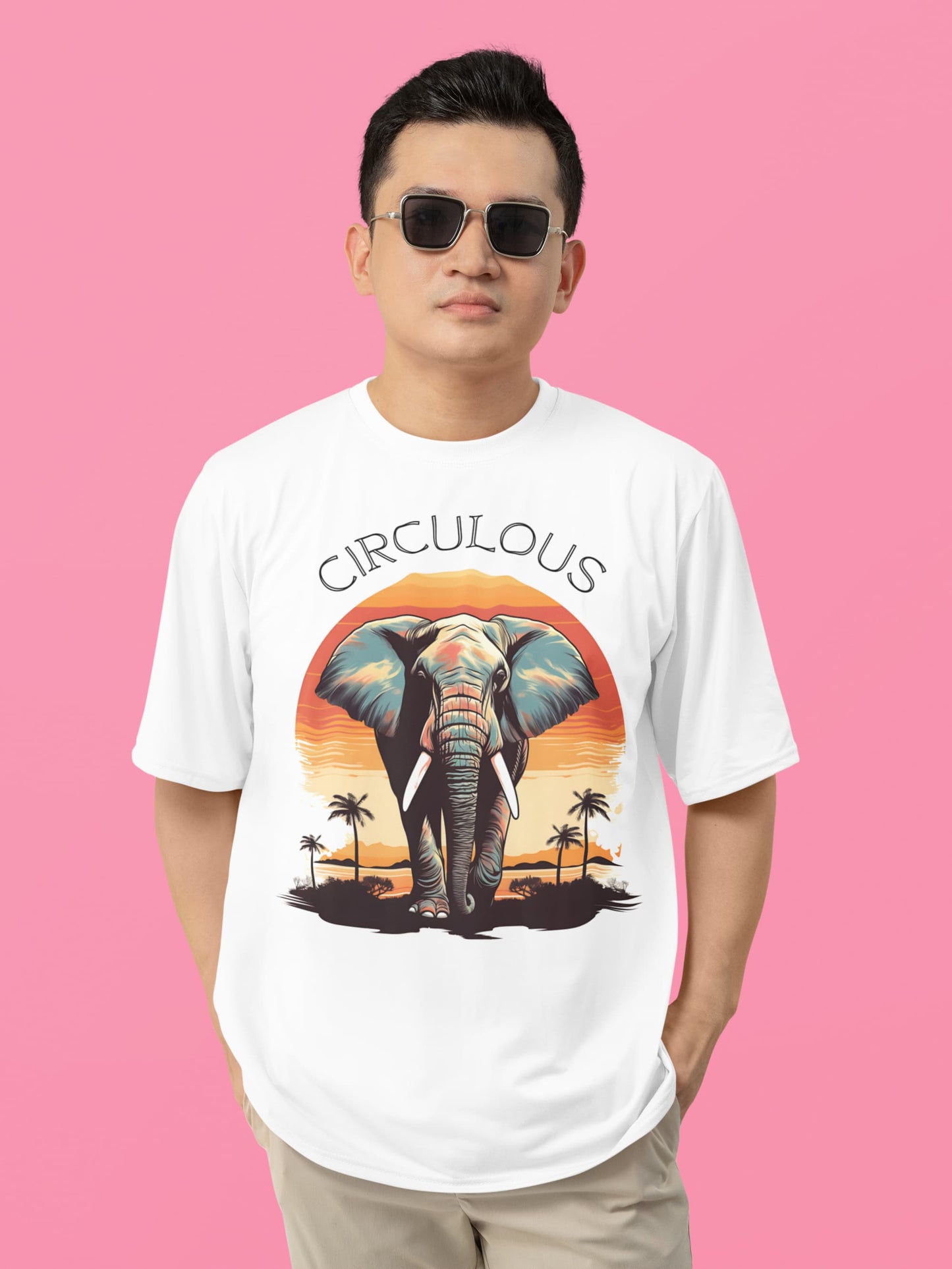 White graphic tee Walking Wonder abstract elephant blues pinks oranges
